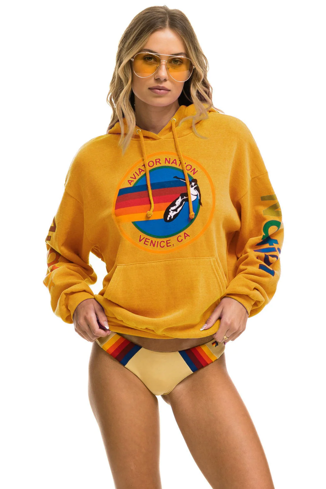 AVIATOR NATION UNISEX RELAXED PULLOVER HOODIE IN GOLD
