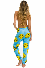 Load image into Gallery viewer, AVIATOR NATION SMILEY REPEAT SWEATPANTS - SKY