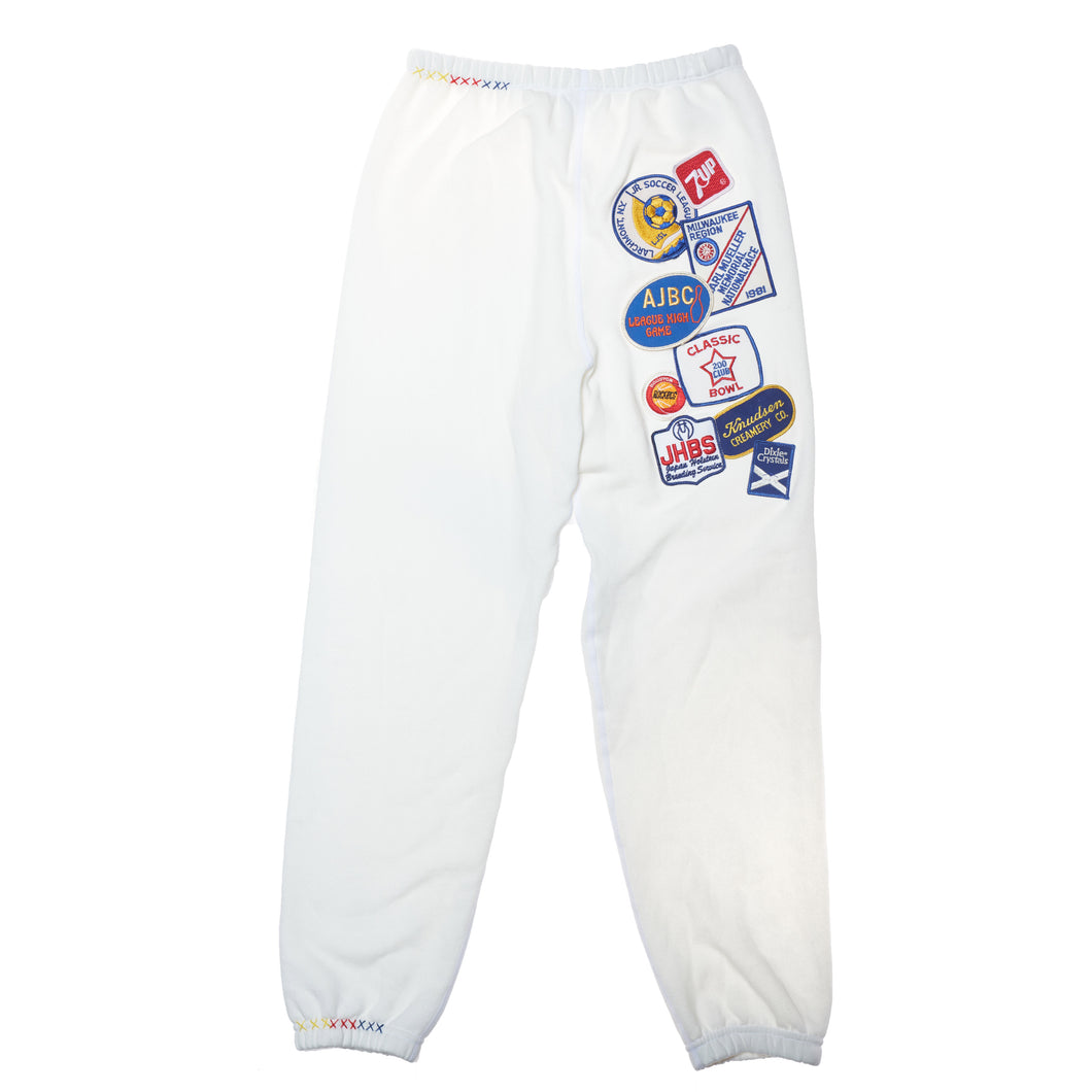 Riley Vintage Patched Up Sweatpants in White ships in 2 weeks